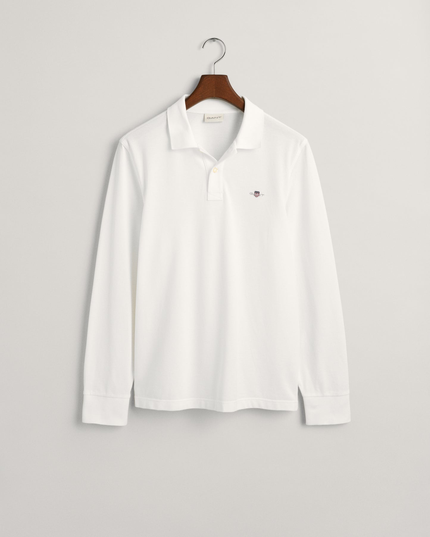 WHITE, REG SHIELD LS PIQUE POLO, FLAT-LAY BY GANT AU.