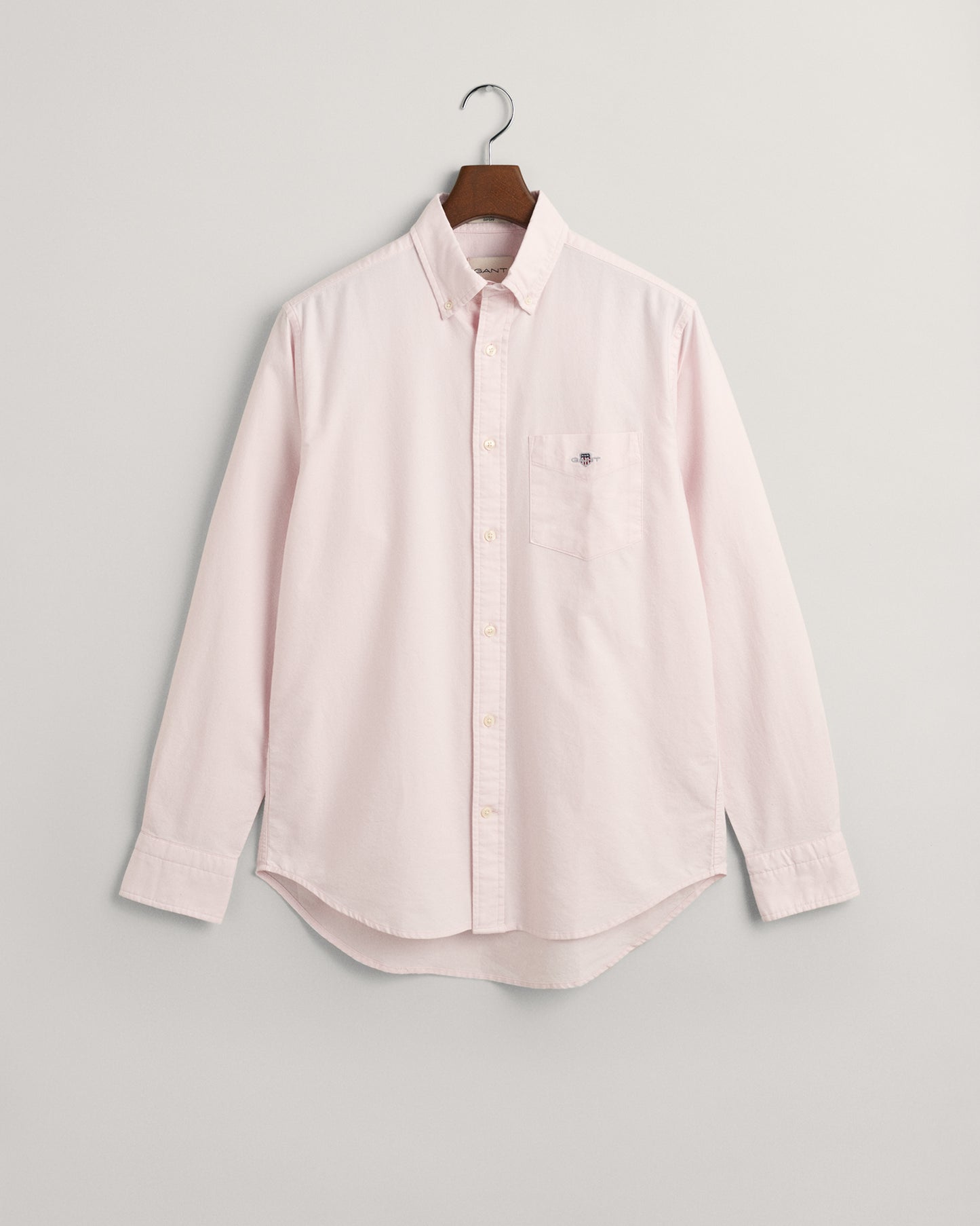 LIGHT PINK, REG OXFORD SHIRT, FLAT-LAY BY GANT AU.