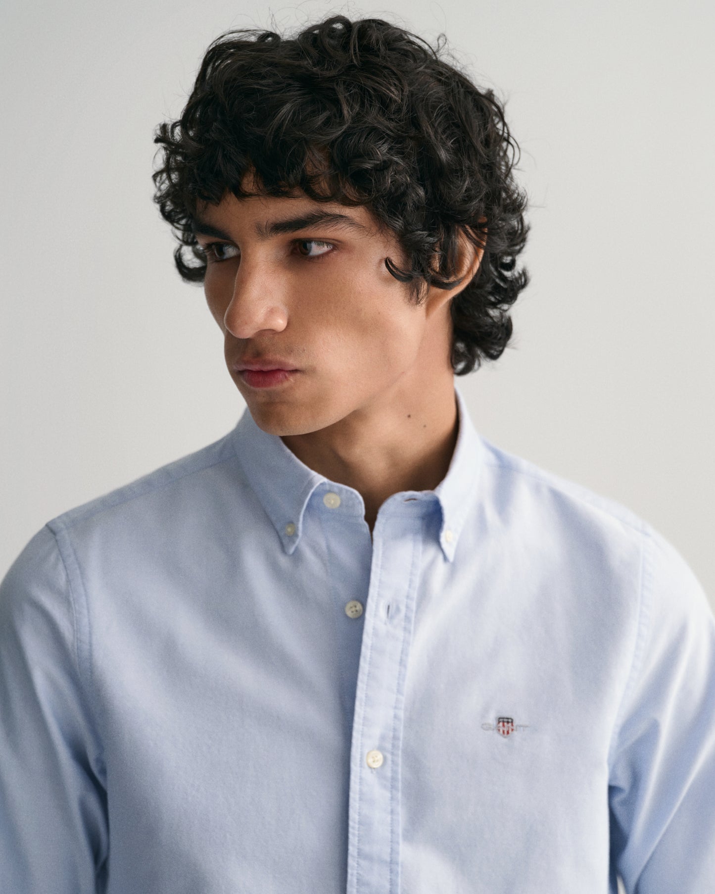 MODEL WEARING SLIM OXFORD SHIRT