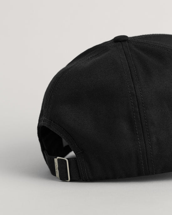 BLACK, UNISEX. SHIELD HIGH CAP, CLOSE-UP BY GANT AU.