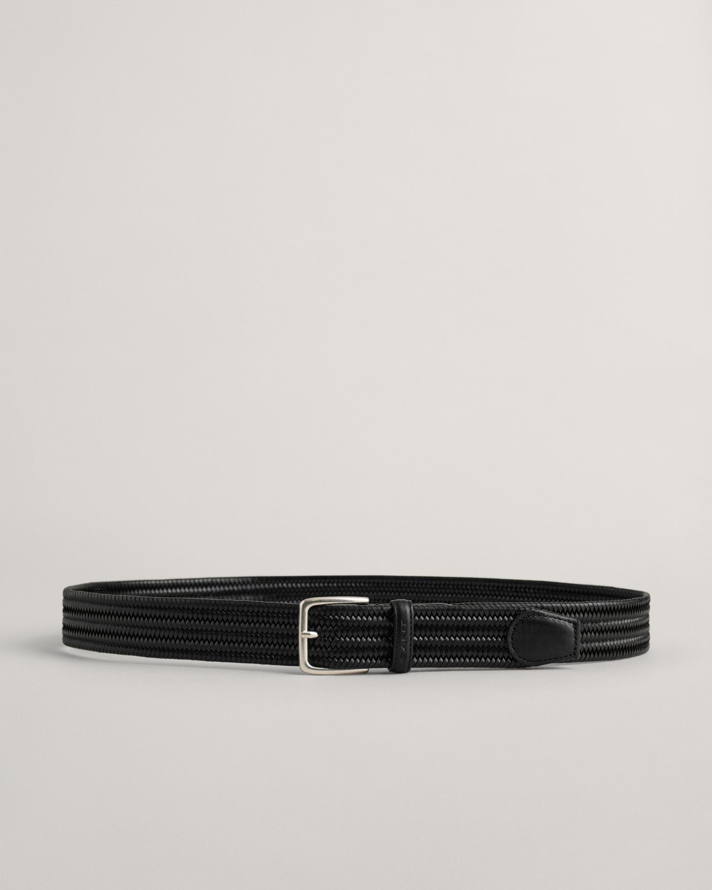 BLACK, LEATHER ELASTIC BRAIDED BELT, FRONT-VIEW BY GANT AU.