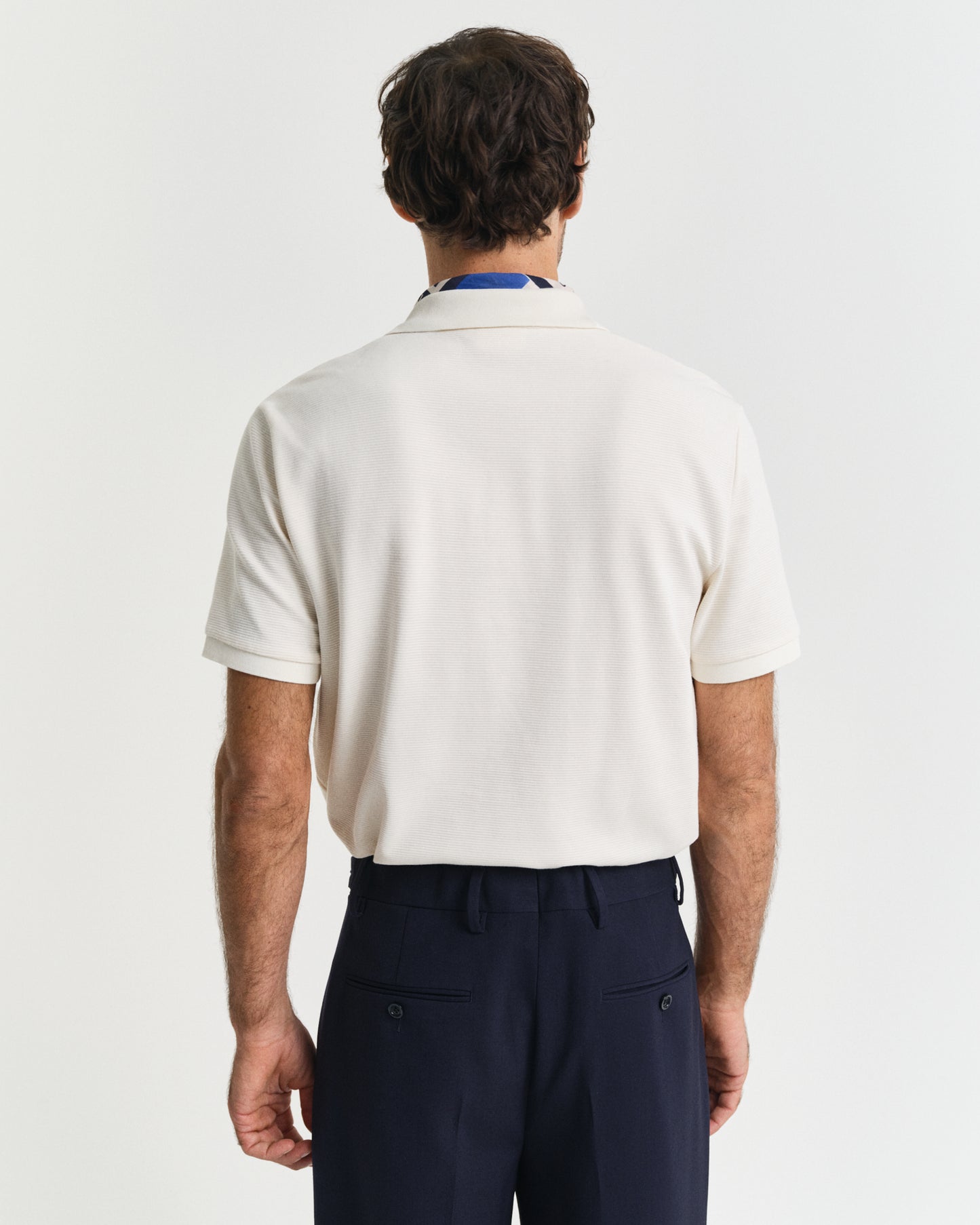 CREAM, TEXTURED POLO, BACK-VIEW BY GANT AU.