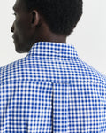 MODEL WEARING REG CLASSIC POPLIN GINGHAM SHIRT