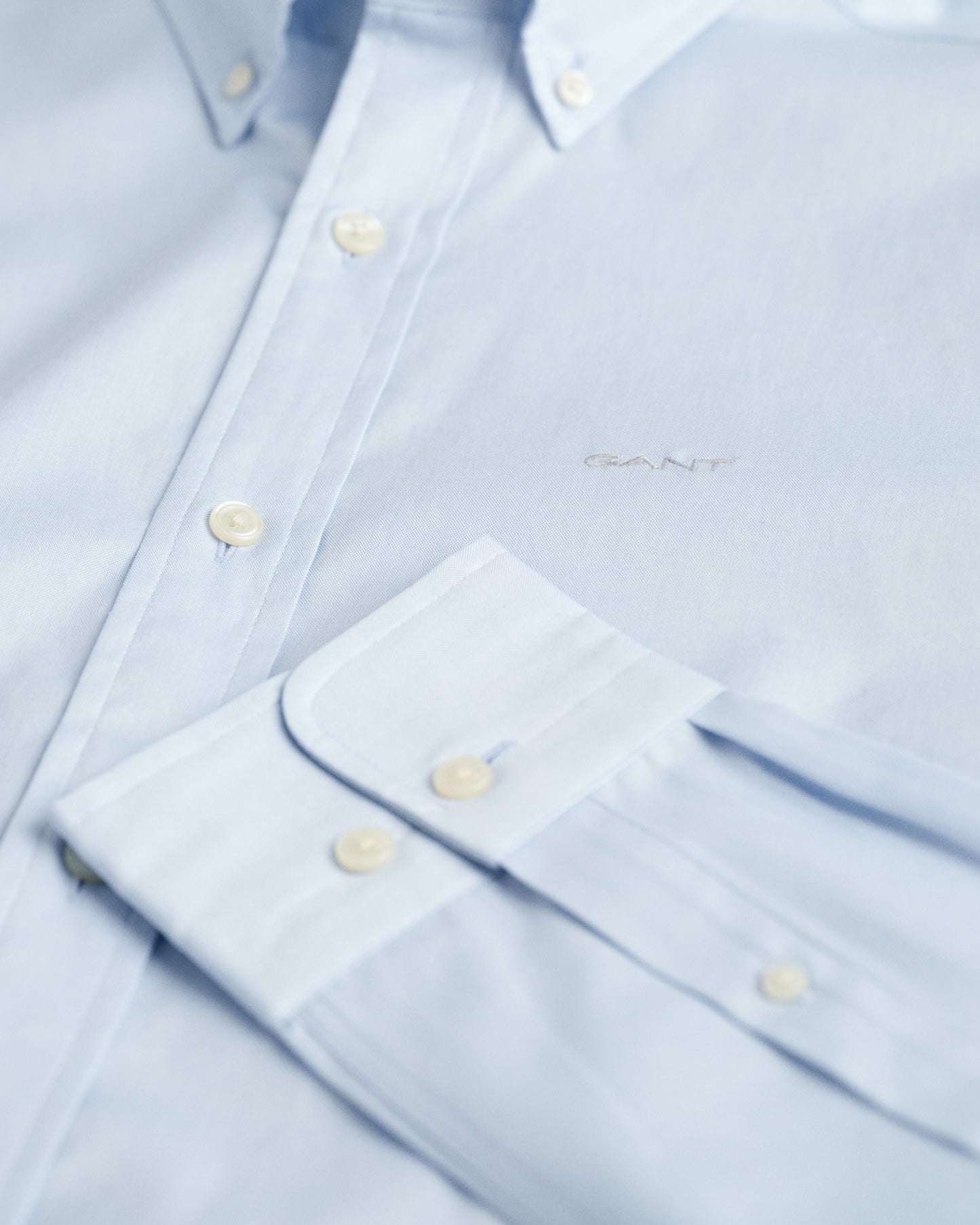 LIGHT BLUE, REG PINPOINT OXFORD SHIRT, FLAT-LAY BY GANT AU.