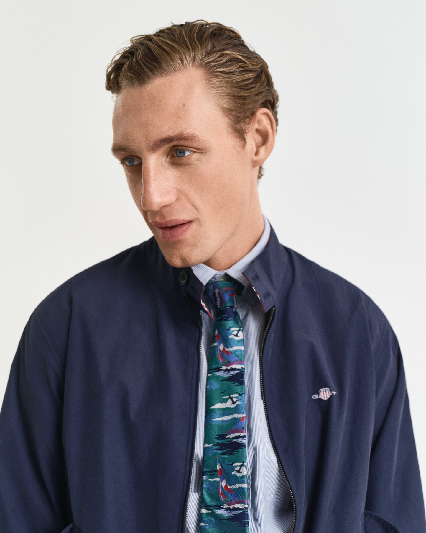 MODEL WEARING REVERSIBLE HARRINGTON JACKET