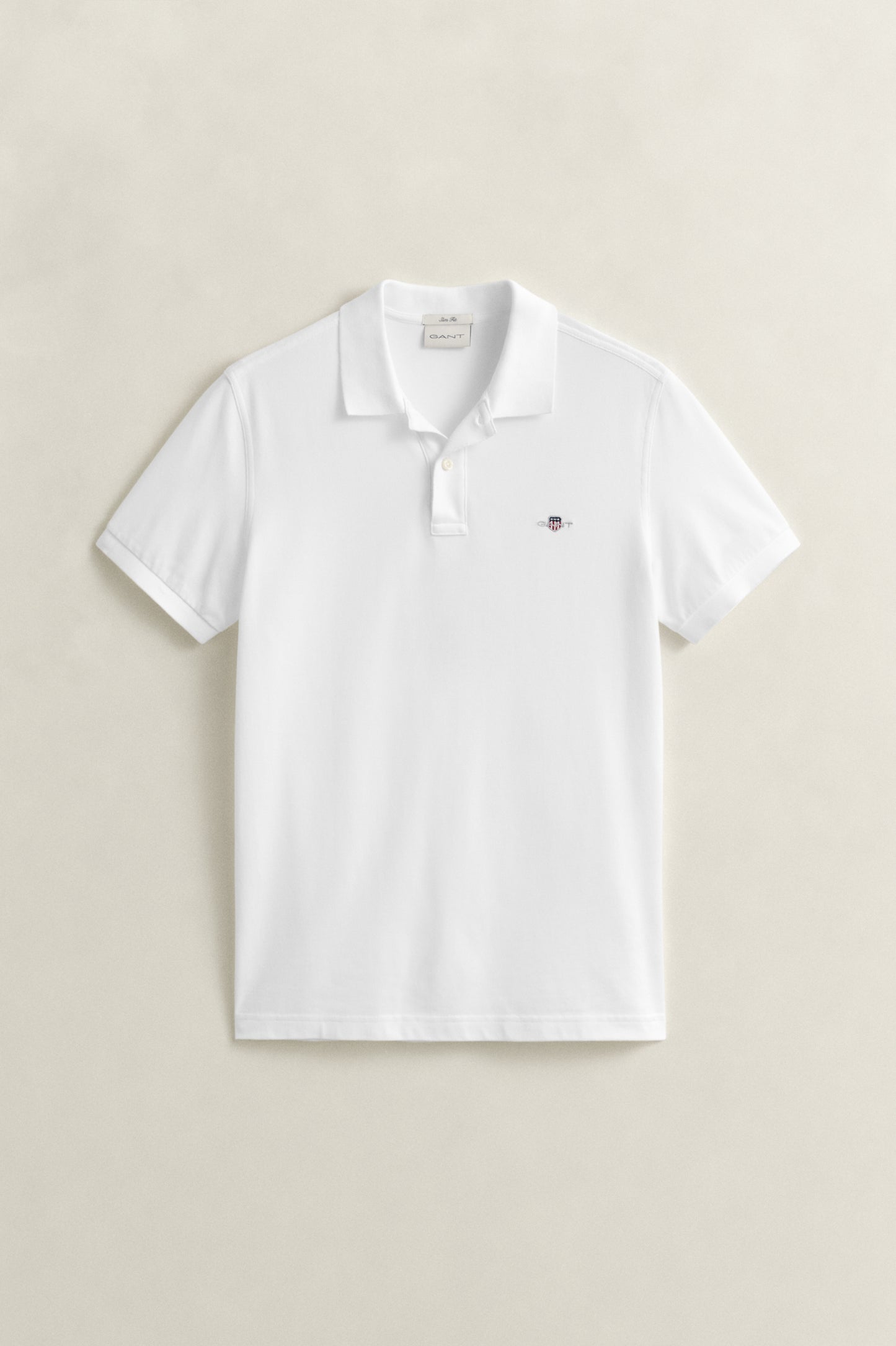 WHITE, SLIM SHIELD SS PIQUE POLO, FLAT-LAY BY GANT AU.