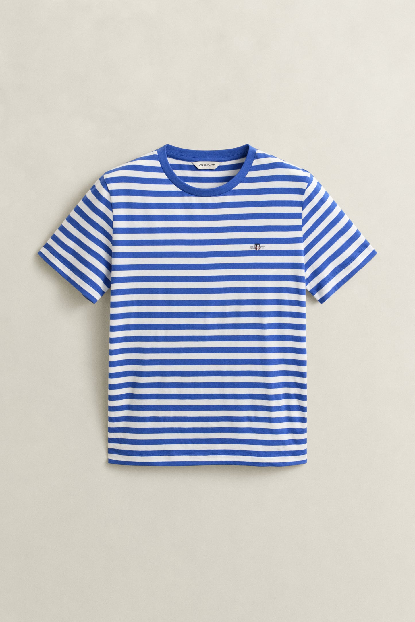 ROYAL BLUE, REG STRIPED SHIELD SS T-SHIRT, FLAT-LAY BY GANT AU.