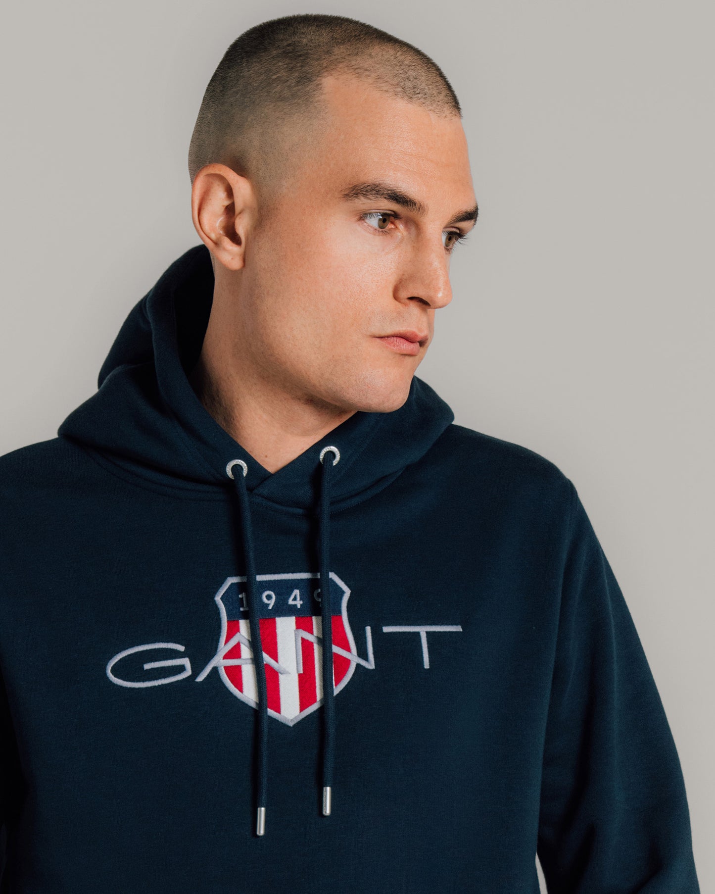 MODEL WEARING Shield Hoodie