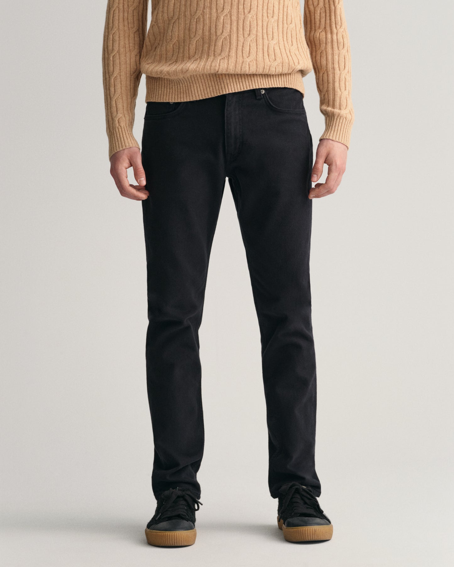 MODEL WEARING SLIM SOFT TWILL JEANS