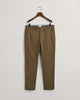 JUNIPER GREEN, SLIM TWILL CHINOS, FLAT-LAY BY GANT AU.