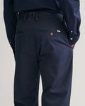 MODEL WEARING REGULAR TWILL CHINOS