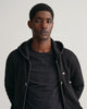 BLACK, REG SHIELD FULL ZIP HOODIE, CLOSE-UP BY GANT AU.