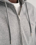MODEL WEARING REG SHIELD FULL ZIP HOODIE