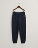 EVENING BLUE, REG SHIELD SWEATPANTS, FLAT-LAY BY GANT AU.