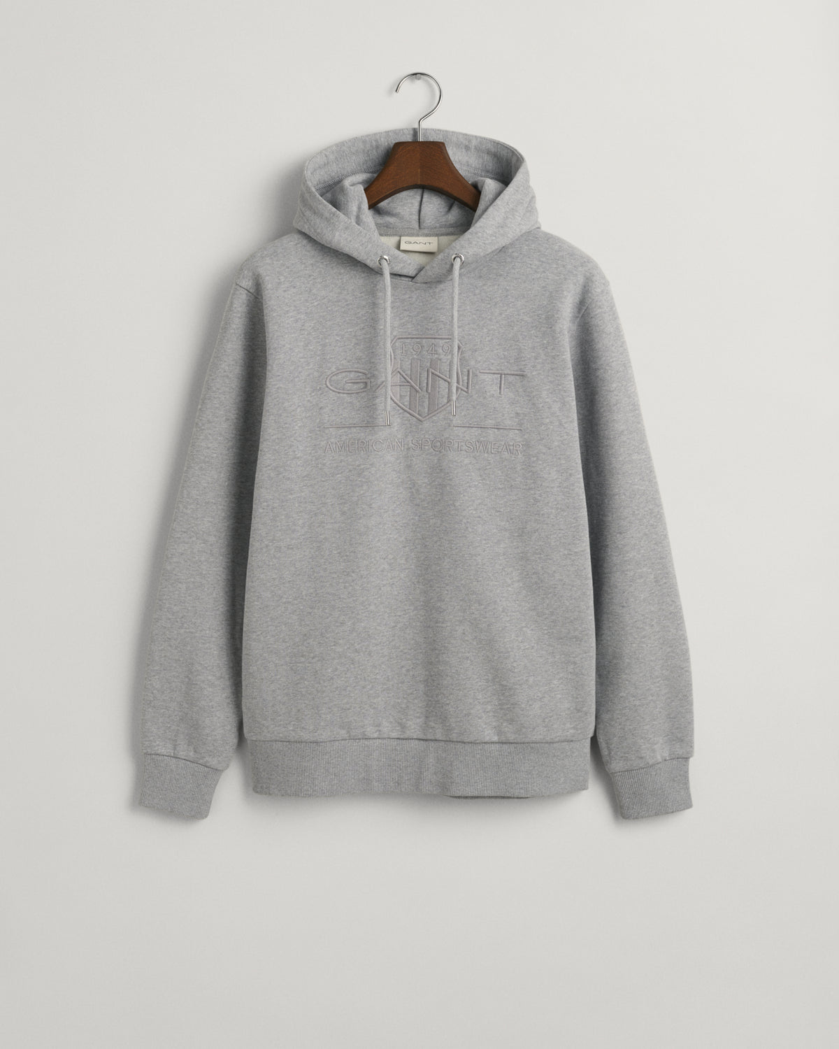 GREY MELANGE, REG TONAL SHIELD HOODIE, FLAT-LAY BY GANT AU.
