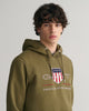 MODEL WEARING REG ARCHIVE SHIELD HOODIE