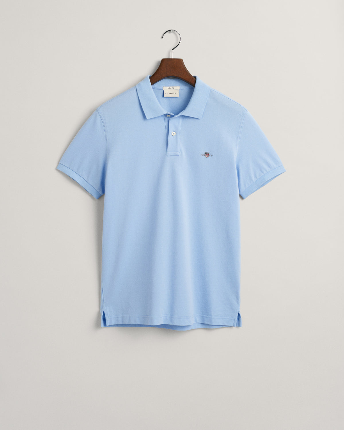 CAPRI BLUE, SLIM SHIELD SS PIQUE POLO, FLAT-LAY BY GANT AU.