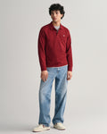 PLUMPED RED, REG SHIELD LS PIQUE POLO BY GANT AU.