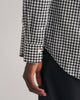 MODEL WEARING REG POPLIN GINGHAM SHIRT
