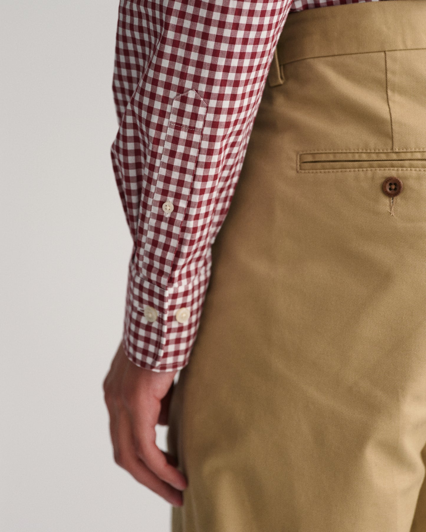 MODEL WEARING REG POPLIN GINGHAM SHIRT