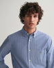 MODEL WEARING REG POPLIN STRIPE SHIRT