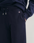 MODEL WEARING SHIELD SWEATPANTS