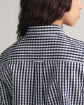 MODEL WEARING REG POPLIN GINGHAM SHIRT