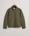JUNIPER GREEN, QUILTED WINDCHEATER, FLAT-LAY BY GANT AU.
