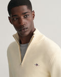 MODEL WEARING CASUAL COTTON HALF ZIP