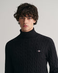 MODEL WEARING COTTON CABLE TURTLE NECK
