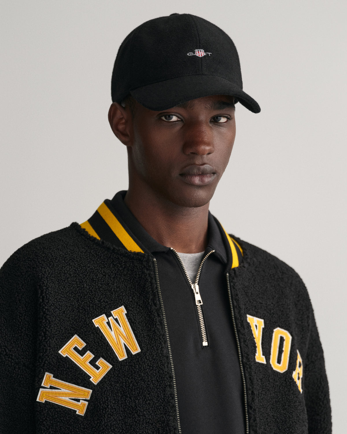 BLACK, SHIELD MELTON CAP BY GANT AU.