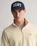 SILKY BEIGE, REG SHIELD HALF ZIP SWEAT, CLOSE-UP BY GANT AU.