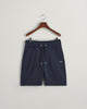 EVENING BLUE, REG SHIELD SWEAT SHORTS, FLAT-LAY BY GANT AU.