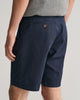 MODEL WEARING SLIM TWILL SHORTS