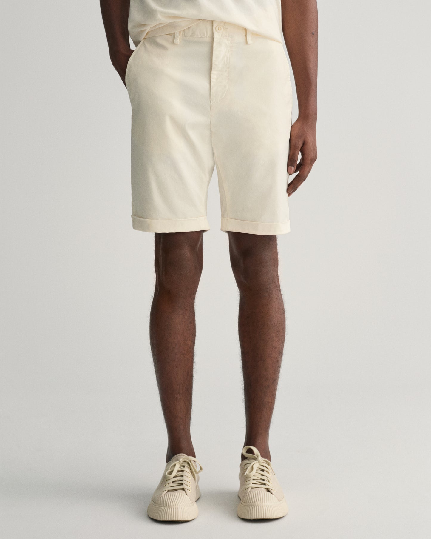 MODEL WEARING SLIM SUNFADED SHORTS