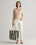 EGGSHELL, SLIM CROPPED WHITE JEANS BY GANT AU.
