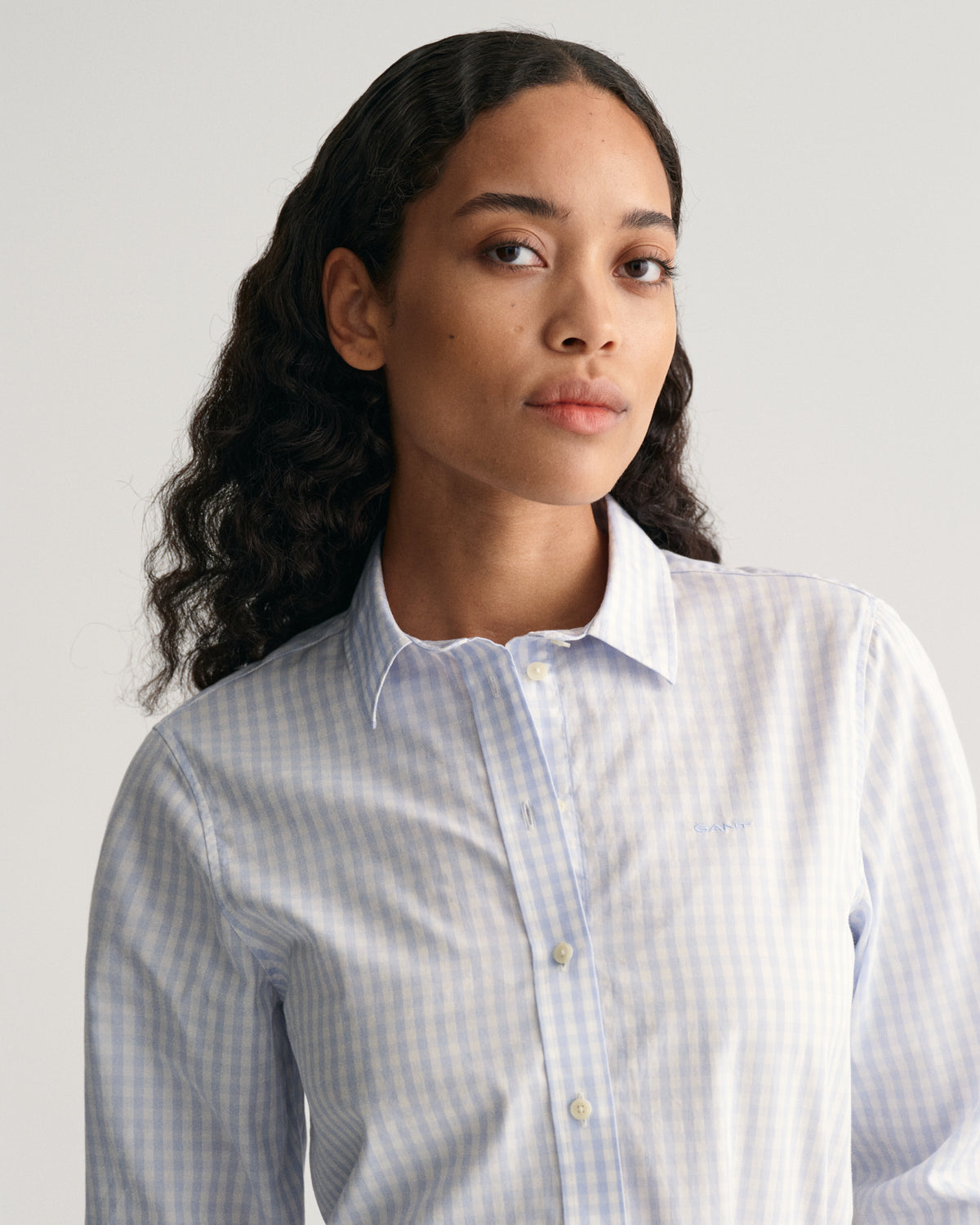 MODEL WEARING REG POPLIN GINGHAM SHIRT