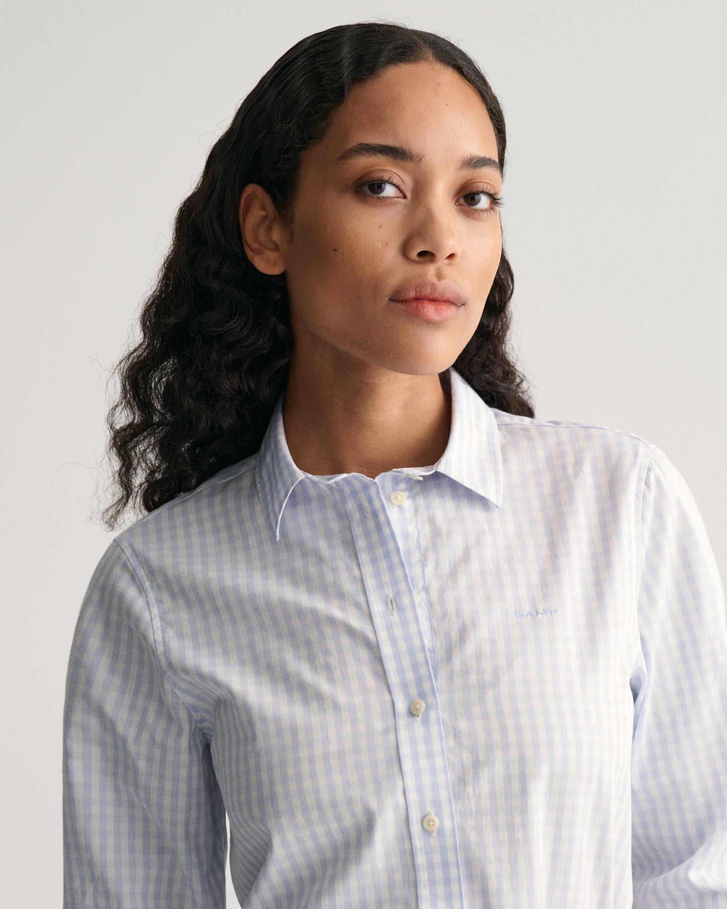 MODEL WEARING REG POPLIN GINGHAM SHIRT