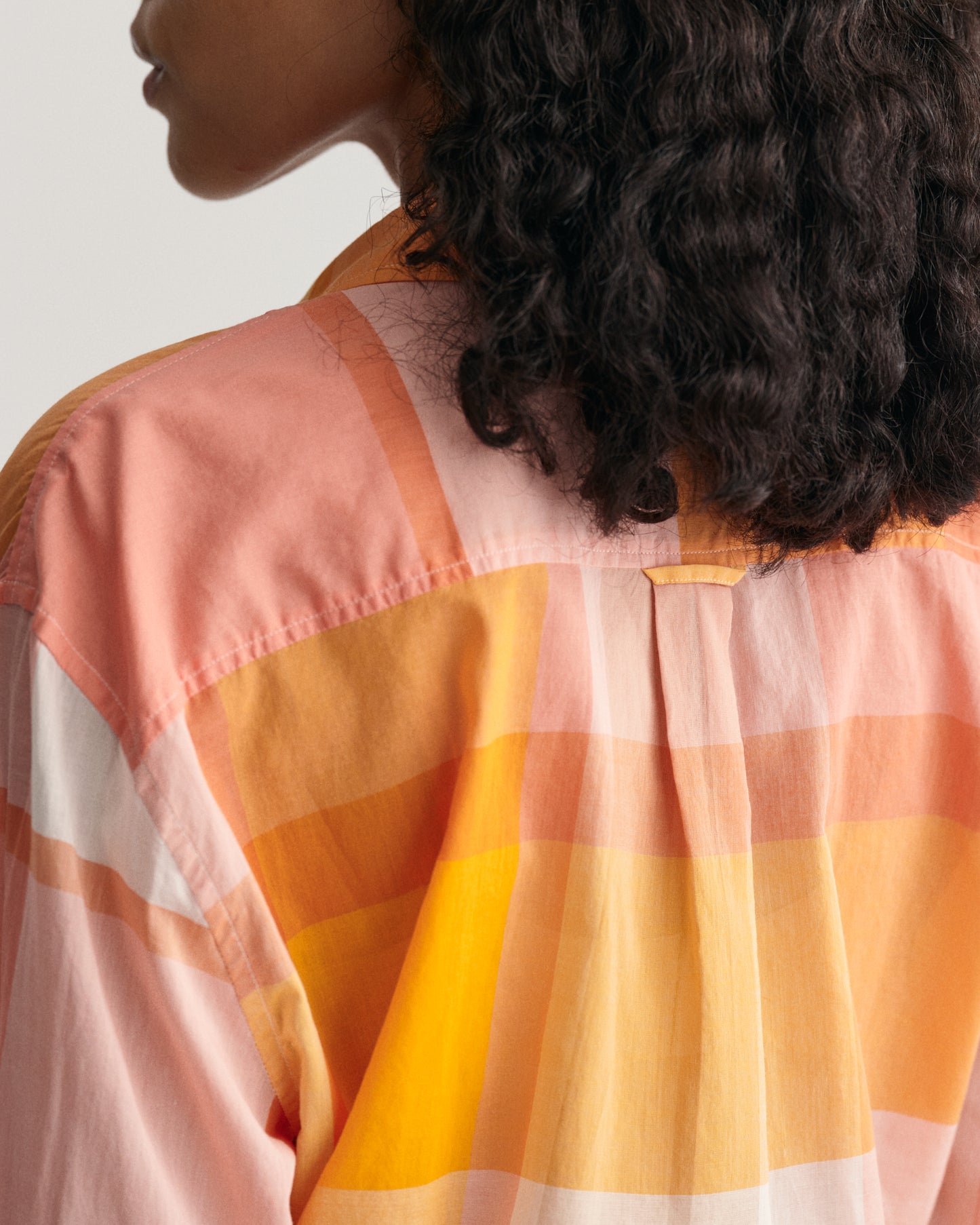 MODEL WEARING REL MADRAS CHECK SHIRT