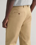 MODEL WEARING REGULAR TWILL CHINOS