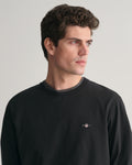 BLACK, REG SHIELD LS T-SHIRT, CLOSE-UP BY GANT AU.