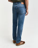 MID BLUE WORN IN, SLIM GANT JEANS, BACK-VIEW BY GANT AU.