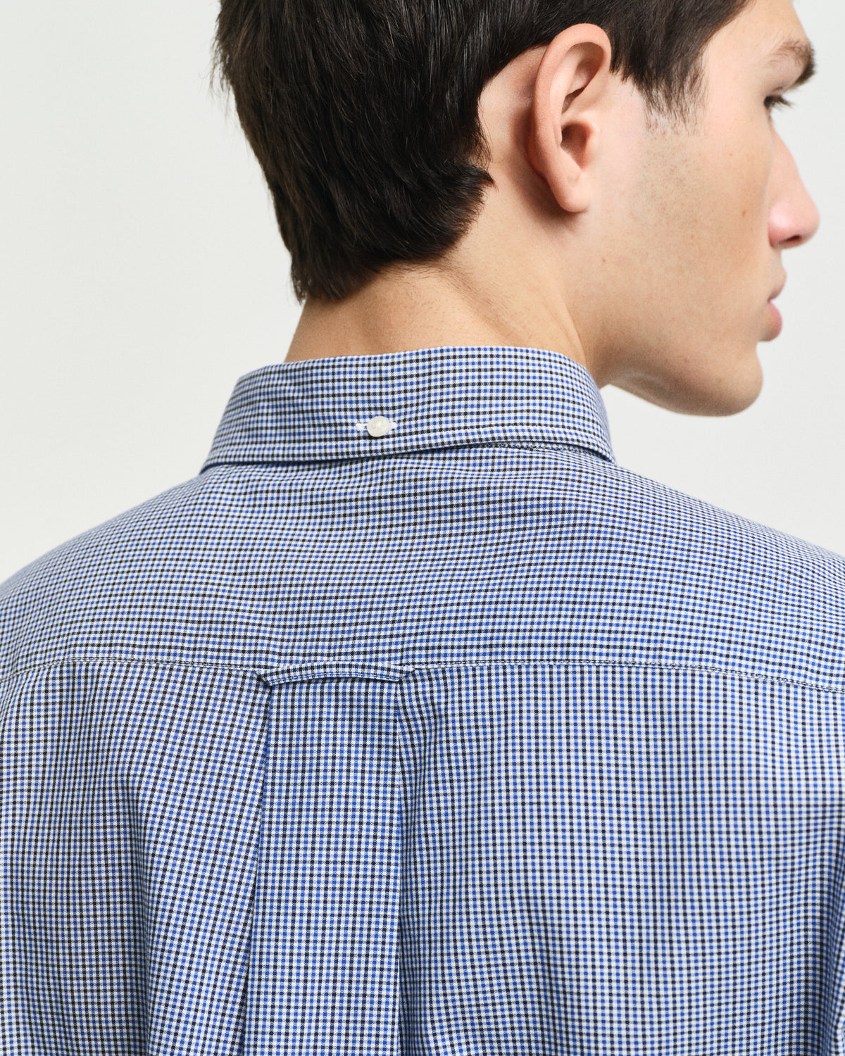 MODEL WEARING REG POPLIN MICRO GINGHAM SHIRT