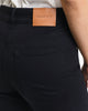MODEL WEARING SLIM FLARE STRETCH JEANS