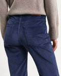 MODEL WEARING CORDUROY FLARE JEANS