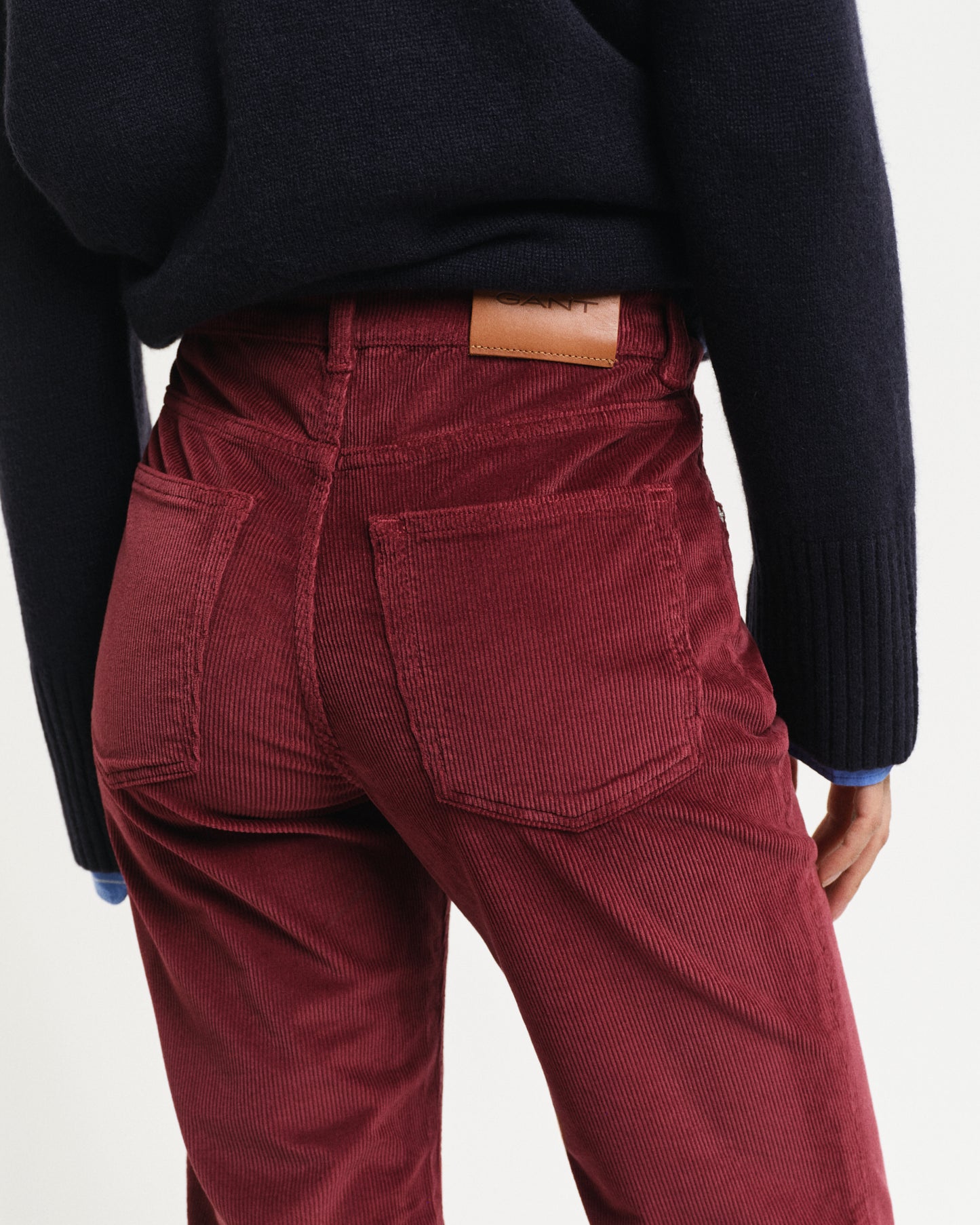 MODEL WEARING CORDUROY FLARE JEANS
