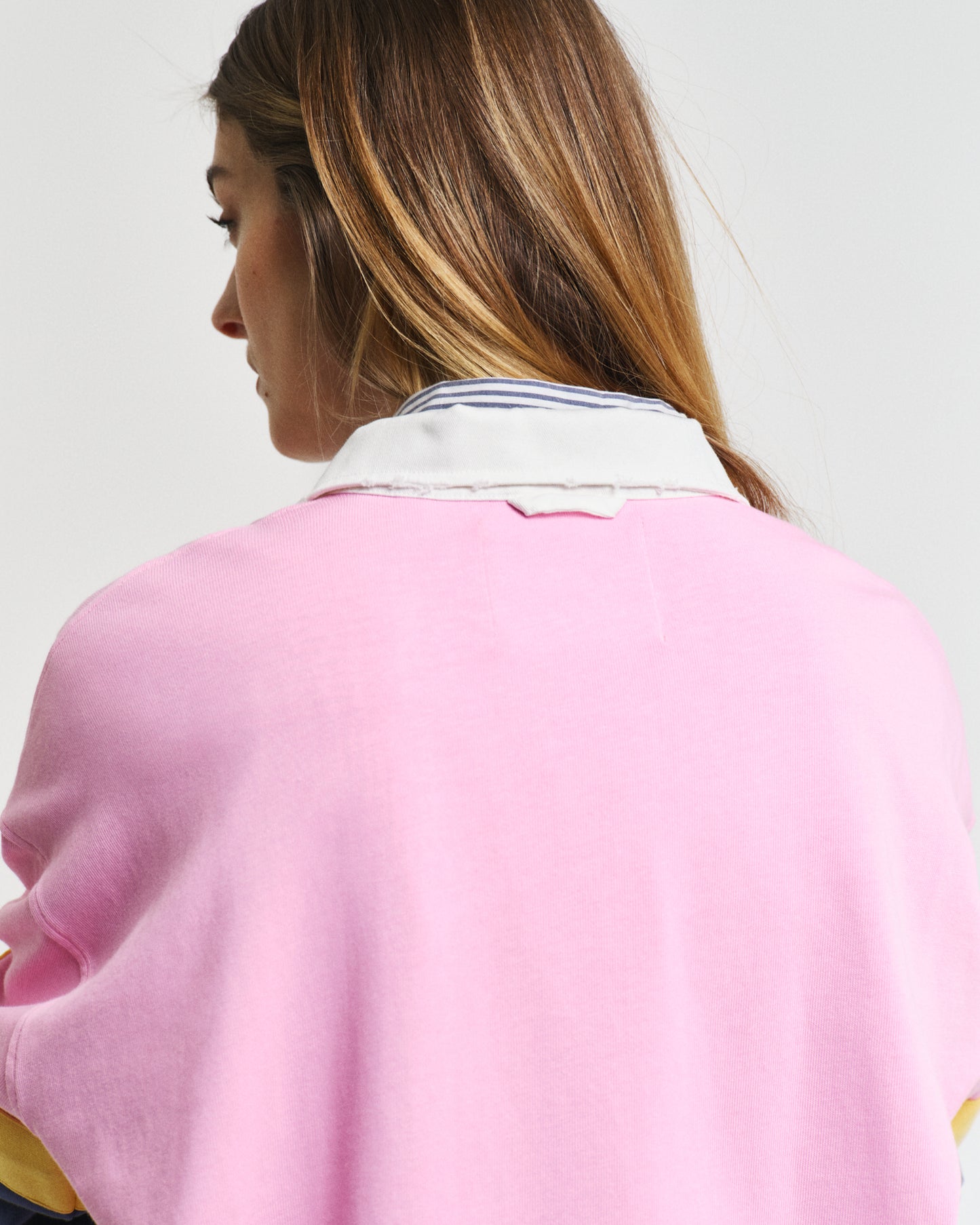 MODEL WEARING COLOR BLOCK RUGGER