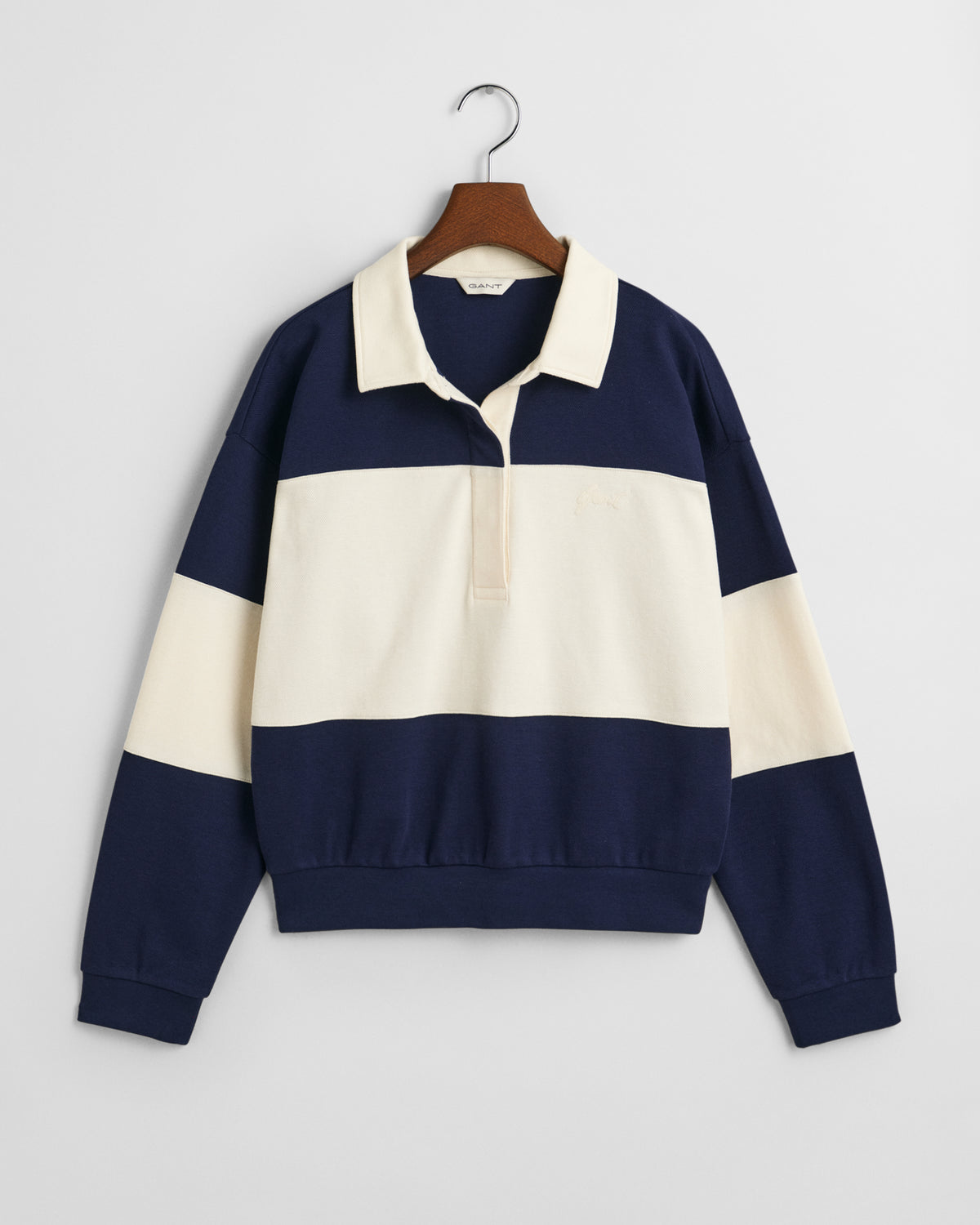 CLASSIC BLUE, PIQUE TEXTURE COLOR BLOCK RUGGER, FLAT-LAY BY GANT AU.