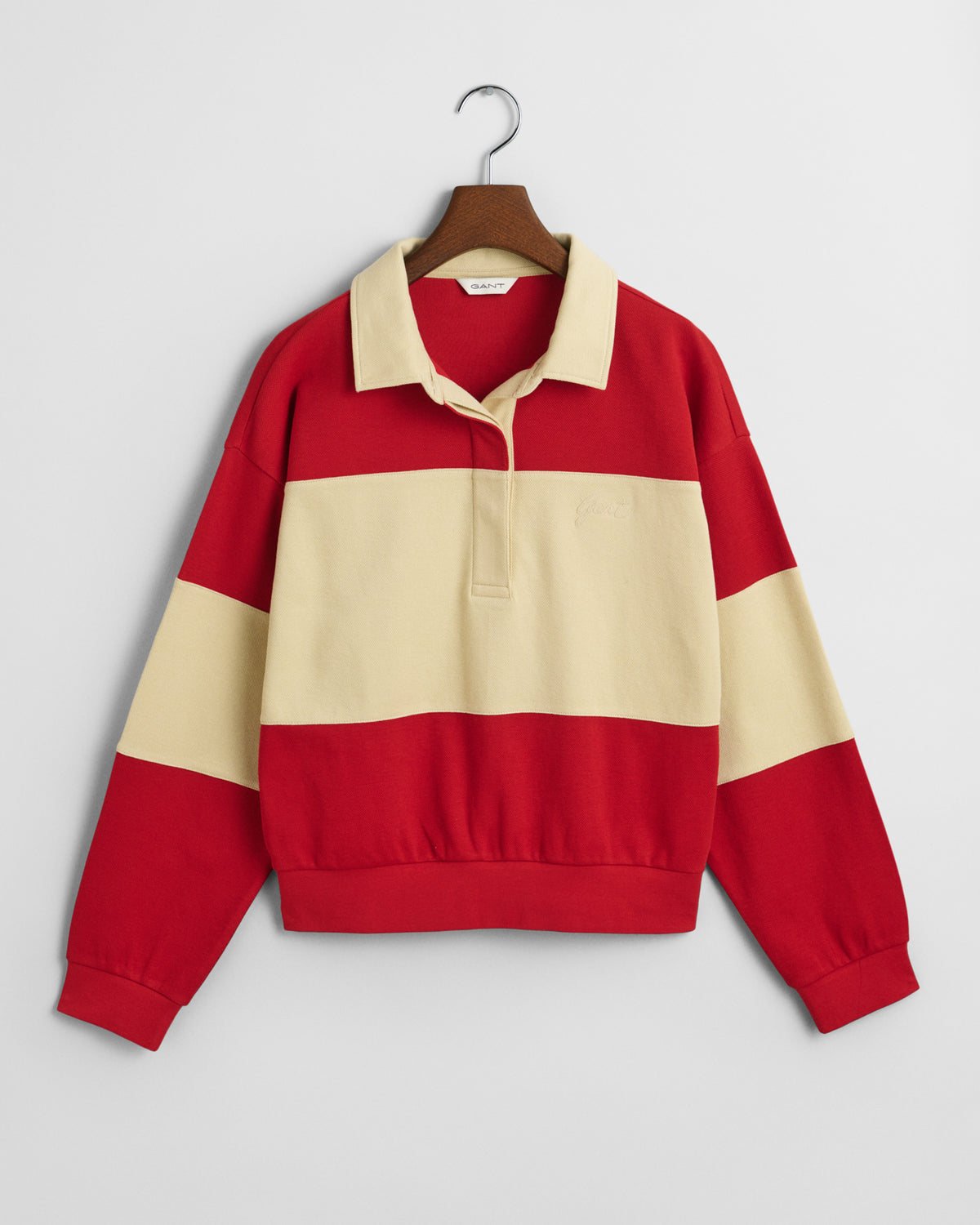 RUBY RED, PIQUE TEXTURE COLOR BLOCK RUGGER, FLAT-LAY BY GANT AU.