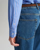 MODEL WEARING REG CLASSIC POPLIN STRIPED SHIRT